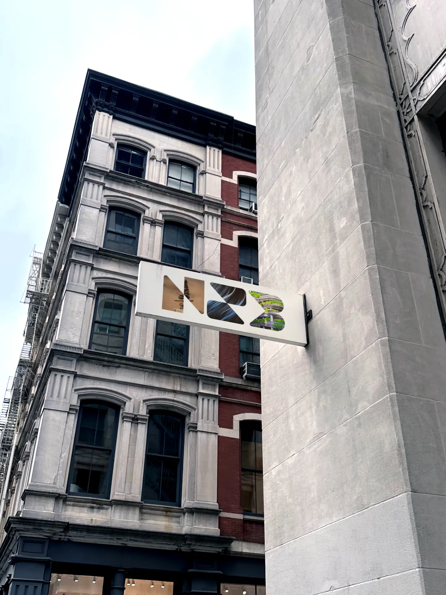 Net Zero Build projecting street sign